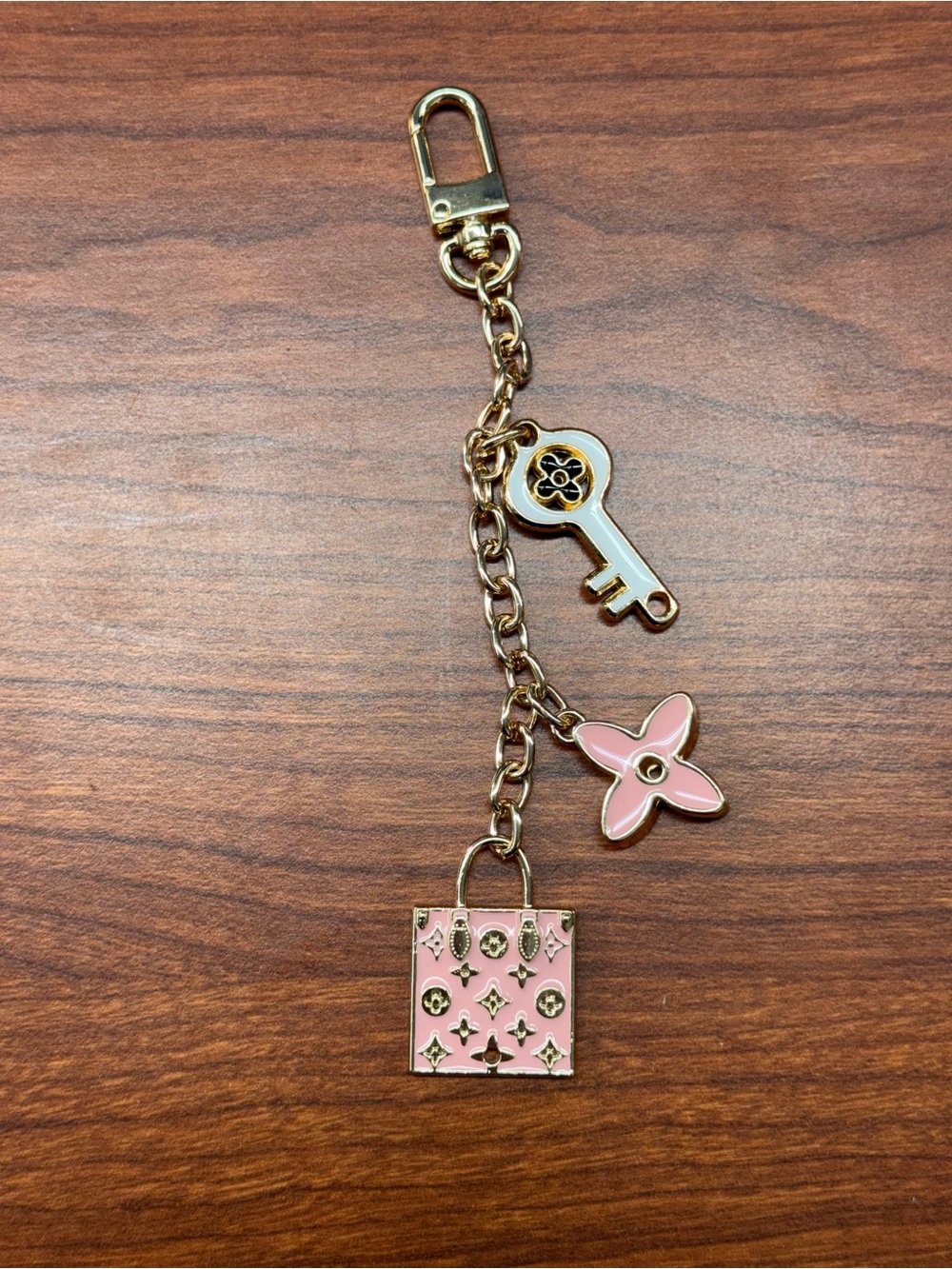 Gold-Tone Pink Enamel Charm Keychain with Bag, Key & Flower Accents